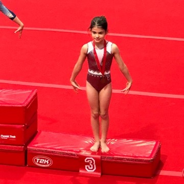 Florence standing on the 3rd place podium