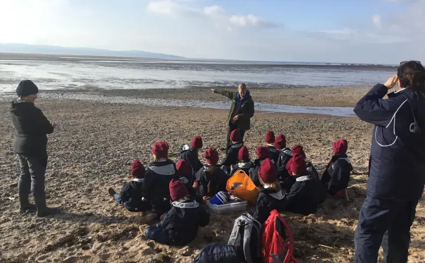 Year 2 learn more about the river at the beach