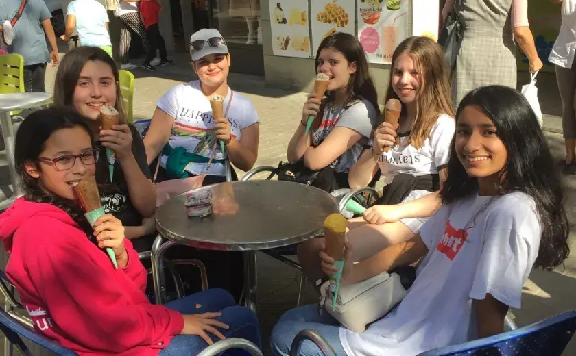 Girls enjoy ice cream on Barcelona trip