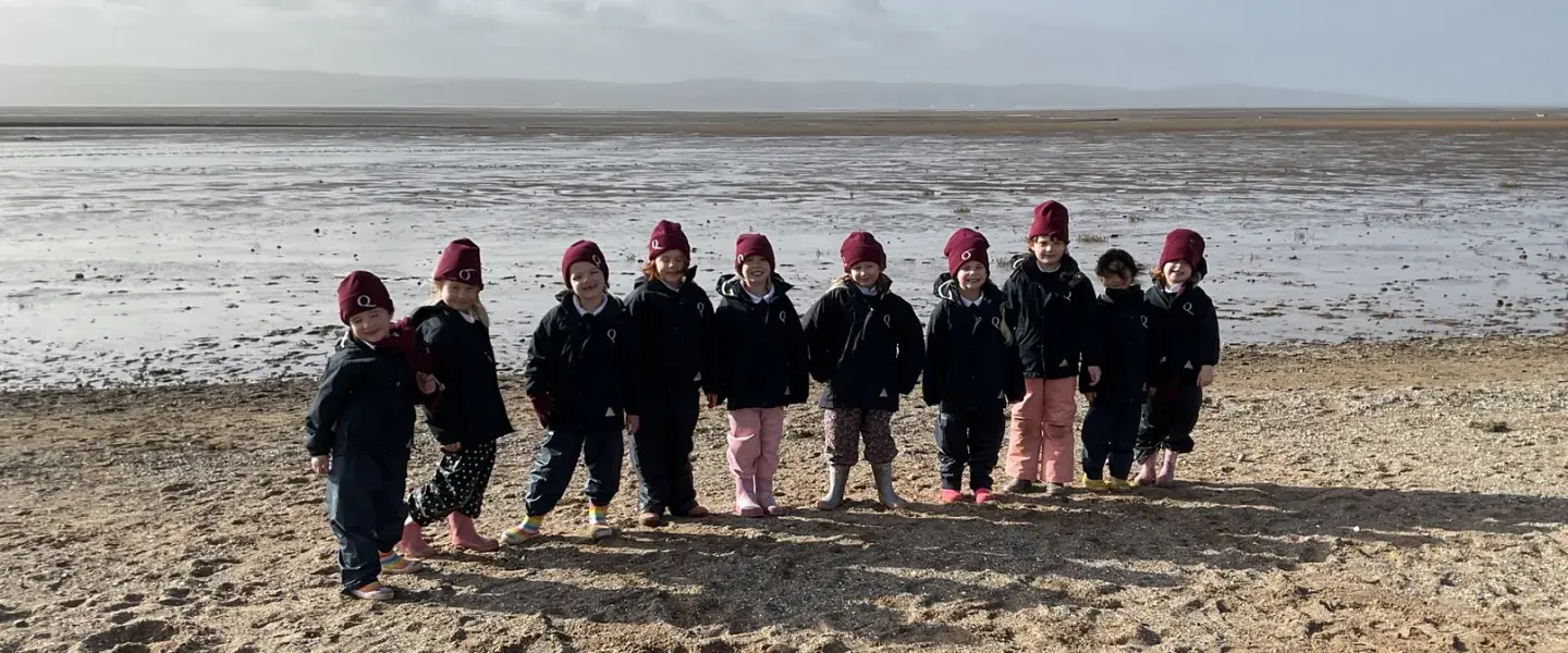 Group photo of Year 1 at the beach